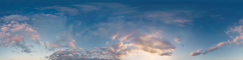 360 panorama of glowing sunset sky with bright Cirrus clouds. Seamless hdr spherical 360 panorama. Sky dome in 3D visualization, sky replacement for aerial drone panoramas. Weather and climate change
