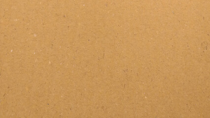 Brown paper texture background for presentation product. Pastel peach illumination, grainy color gradient background