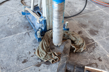 Diamond drill on tripod