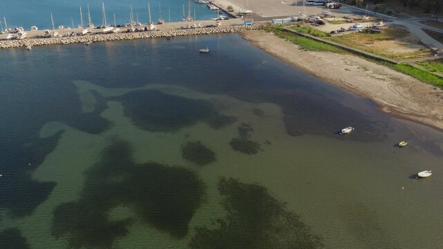 Slow drone reveal shot of Katakolo port in Peloponnese, Greece