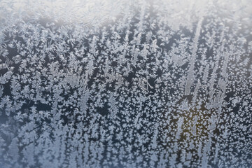 Macro Frost Patterns on Winter Window - Close-Up of Ice Crystals in Cold Weather