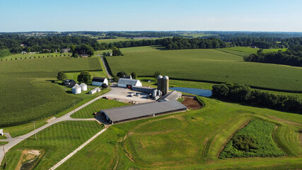 aerial view of agricultural fields, barns and silos on farms in Cochranville, southeastern Pennsylvania © Bo