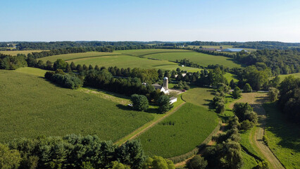 aerial view of agricultural fields, barns and silos on farms in Cochranville, southeastern Pennsylvania © Bo