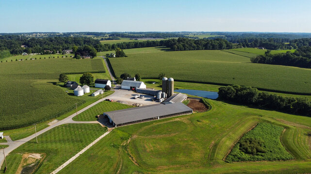 aerial view of agricultural fields, barns and silos on farms in Cochranville, southeastern Pennsylvania