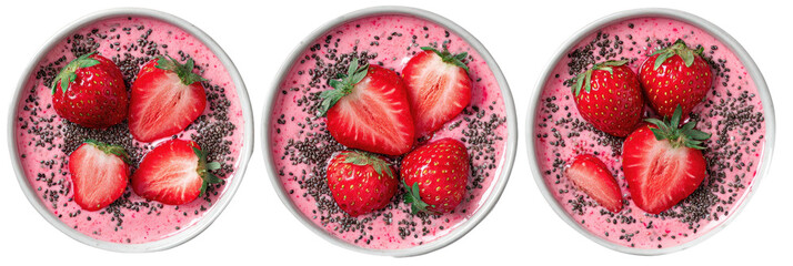 Three pink bowls with strawberries and seeds, overhead