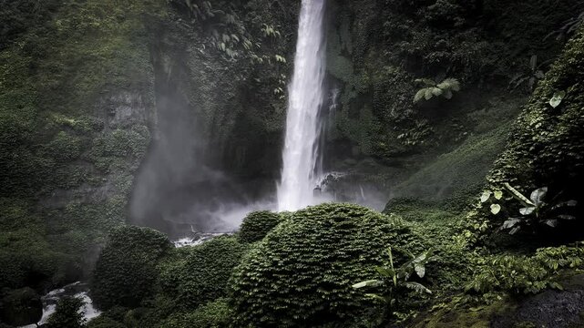 Stunning hidden waterfall near Bromo in Malang. Secret East Java jungle waterfall. Indonesia
