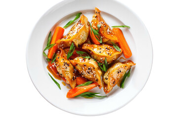 Fried dumplings, carrot, chives on white plate, angled top view