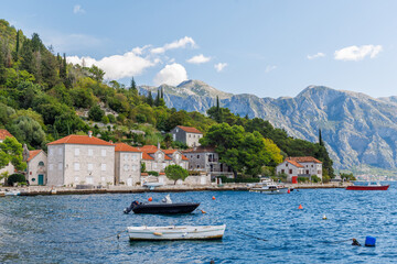 Cozy coastal town in Montenegro with traditional houses and sea view