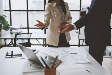 Business professionals discussing strategy during an office meeting
