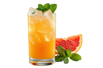 Tall glass filled with orange drink, ice, mint, grapefruit