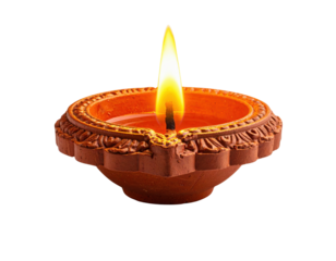A traditional clay oil lamp with a flickering flame, often used in cultural and religious celebrations.