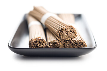 Buckwheat soba noodles isolated on white background.