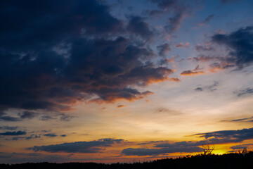  Sunset sky clouds in the Evening with Golden orange sunlight in golden hour, Dusk sky background
