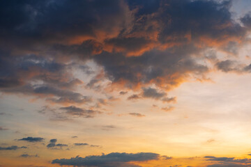  Sunset sky clouds in the Evening with Golden orange sunlight in golden hour, Dusk sky background