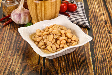 Baked white canned beans in the bowl