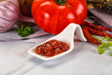 Salsa dip with chili and tomato