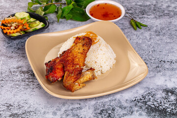 Spicy roasted chicken wing with rice