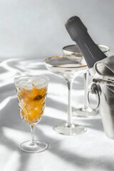 Champagne celebration with sparkling light and shadows