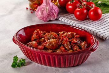 Roasted chicken hearts with vegetables