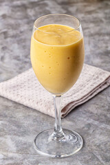 Sweet mango smoothie dessert glass