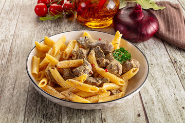 Italian pasta penne with chicken liver