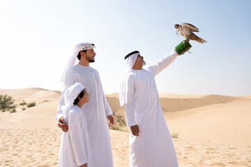Three generation family making a safari in the desert of Dubai