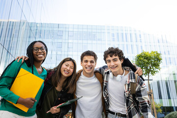Cheerful university students smiling together on campus