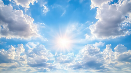 Bright blue sky with fluffy clouds and radiant sunlight creating serene atmosphere