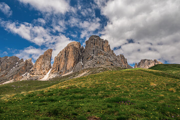 Sasso Lungo mountai range images with a cloudy sky in the background, Val di Fassa, Dolomites, Italy