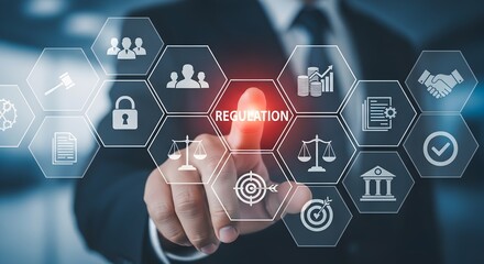 A businessman's hand interacts with a digital interface displaying regulation icons, representing compliance and legal frameworks.