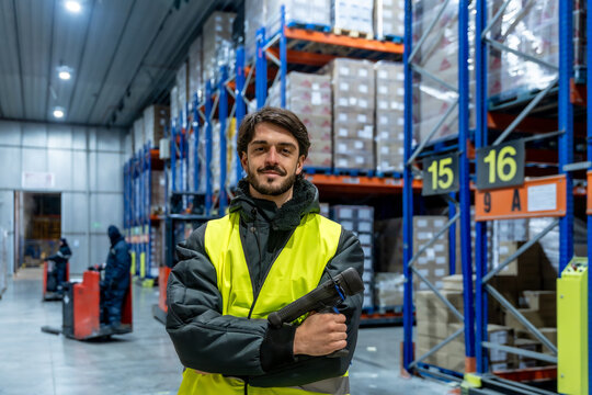 Warehouse worker managing inventory in cold storage logistics