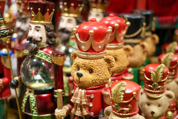 Royal teddy bears and nutcracker soldiers in vibrant red and gold—perfect for holiday nostalgia and festive themed displays.