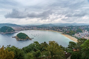 Fototapeta premium La Concha Bay and Santa Clara Island Aerial View from Monte Igueldo, San Sebastian, Basque Country, Spain