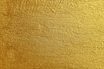 Gold Paint on Concrete Wall Texture Background.