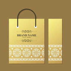 Golden Shopping Bag Design with Decorative Bookmark Ornament