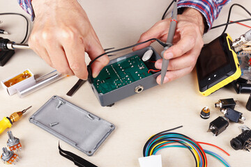 Maintenance of electrical devices at service workplace.