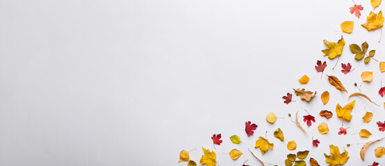Autumn composition. Pattern made of dried leaves and other design accessories on table. Flat lay, top view