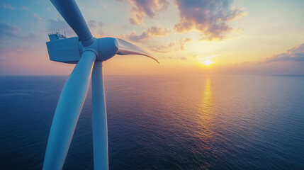 Offshore wind turbine at ocean sunset