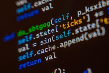 A detailed view of programming code displayed on a computer screen, showcasing syntax highlighting in various colors.