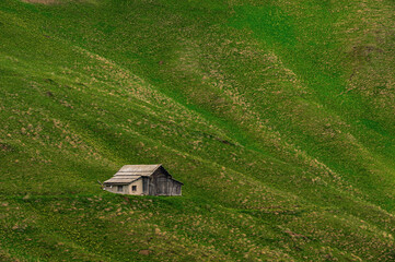 Obraz premium Sella mountain range and Sasso Pordoi images from Col Rodella with a cloudy sky in the background, Dolomites, Italy
