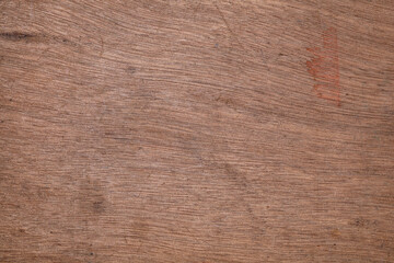 Wooden crate surface with paint stains and wear marks
