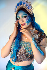 Mermaid cosplay with body art showcasing vibrant colors and intricate details