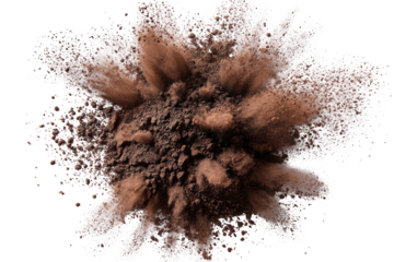 Brown powder explosion on a black background, close up shot