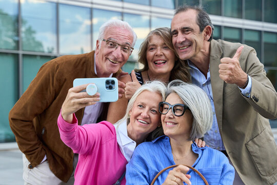 Group of senior friends taking a selfie together