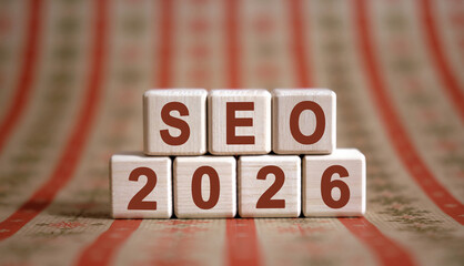 Numbers 2026 and text Seo on cubes on a ornament background