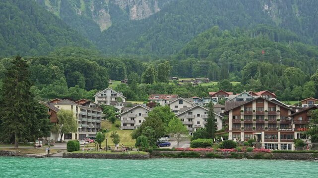Aerial View of Iseltwald Village and Historic Church on Lake Brienz, Switzerland,Filmed on 29 August 2025