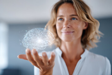 Woman holding a glowing brain illustration