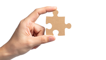 A hand holding a single jigsaw puzzle piece, symbolizing problem-solving and completeness. The piece has a unique shape and is ready to be integrated