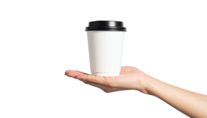 A hand holding a disposable coffee cup