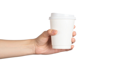A hand holding a disposable coffee cup